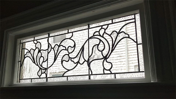 Victorian window with hand-blown glass