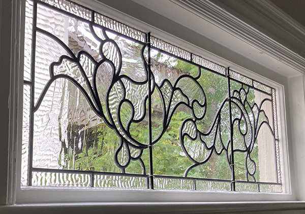 Victorian window with hand-blown glass