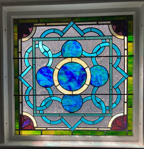 Opalescent Vistorian interlaced leaded glass design