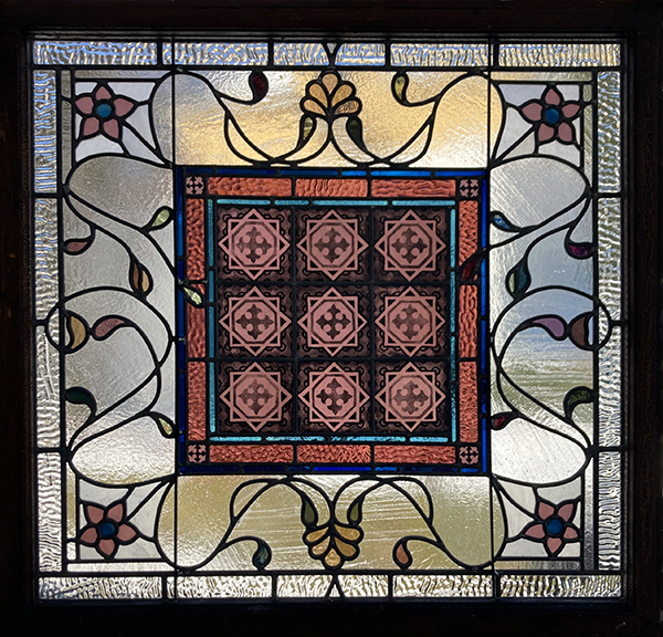Religious glass design with cross pattern
