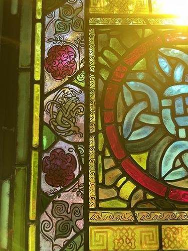 Celtic dogs interlaced stained glass