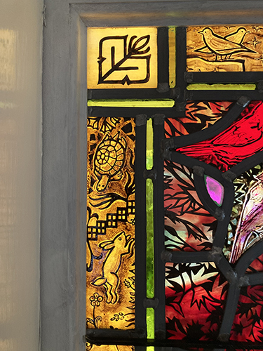 red rocks stained glass turtle and rabbit